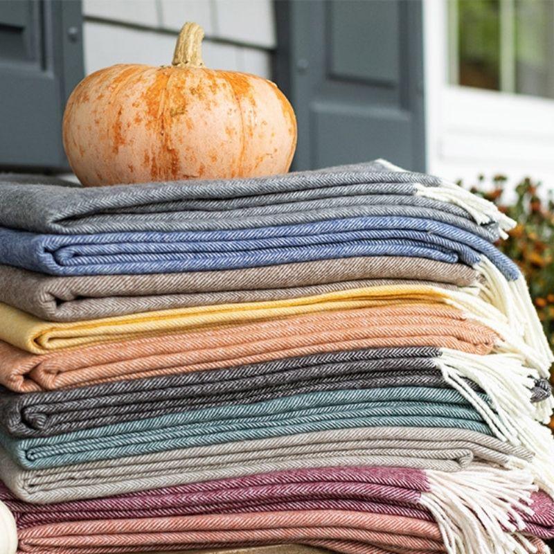 Snuggle up cozy blankets to layer on the bed couch and even